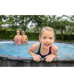 Discount Piscina fuori terra con struttura rotonda "steel pro max" effetto legno scuro 427x427x107 cm Piscine